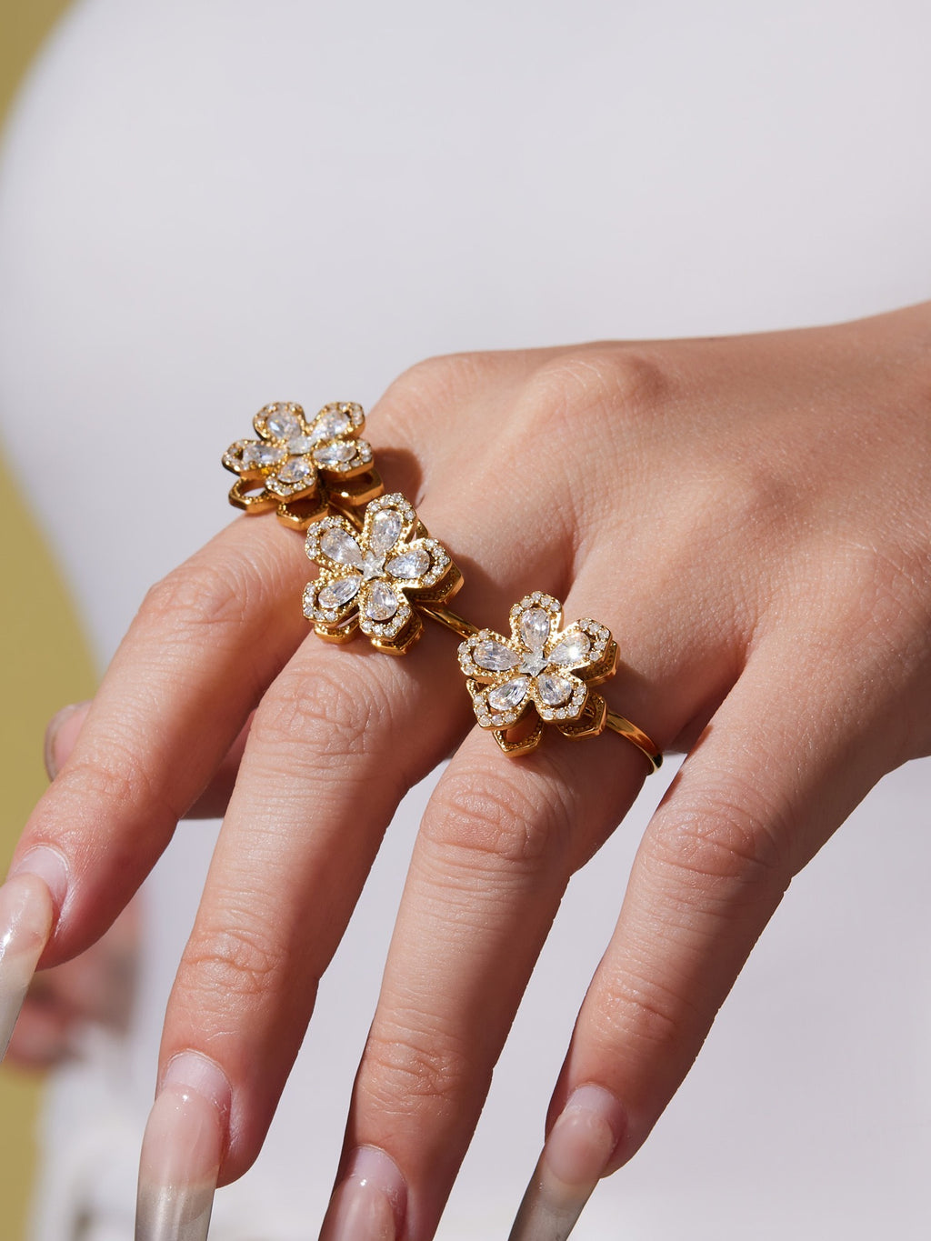 The Rotating Bloom Trio - Kinetic Five-Petal Flower Set in Stainless Steel & Zircon
