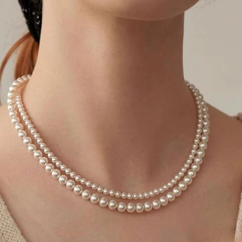 Timeless Solitaire · Upgraded Titanium Steel Clasp Pearl Necklace