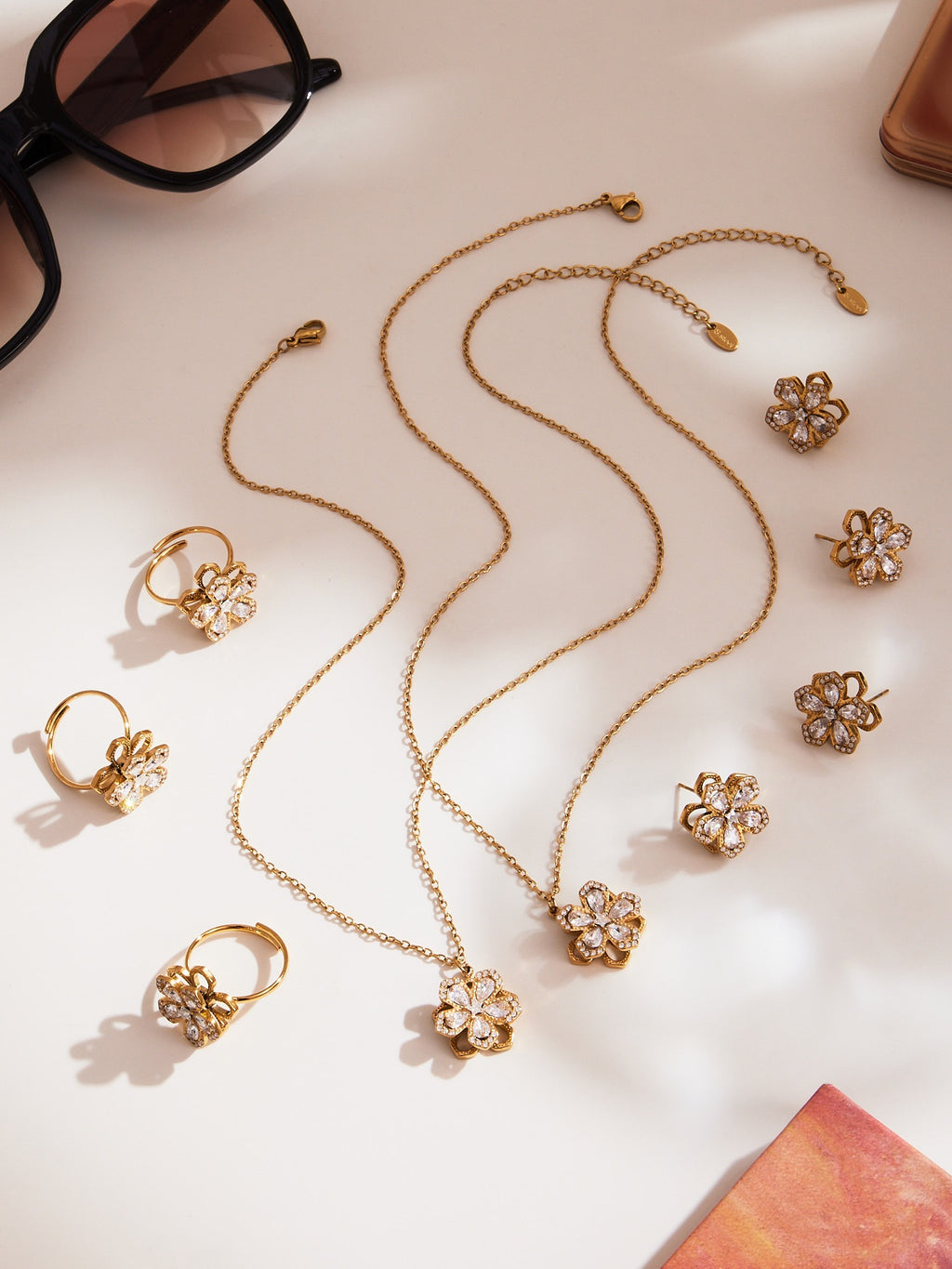 The Rotating Bloom Trio - Kinetic Five-Petal Flower Set in Stainless Steel & Zircon