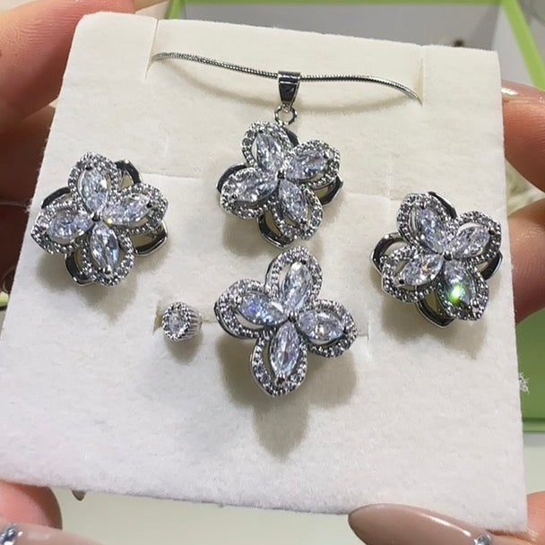 Rotating Four-Petal Flower Jewelry Set - Necklace, Earrings & Ring | “Good Luck Turn” Moving Charm