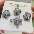 Rotating Four-Petal Flower Jewelry Set - Necklace, Earrings & Ring | “Good Luck Turn” Moving Charm