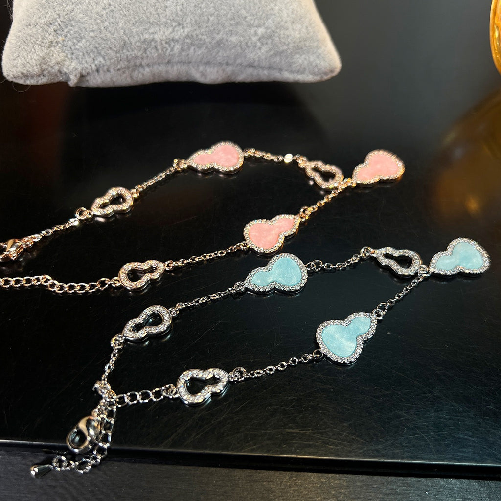 Heart’s Desire Bracelet – Adjustable Pink/Blue Zirconia Love Charm | Everyday Elegance