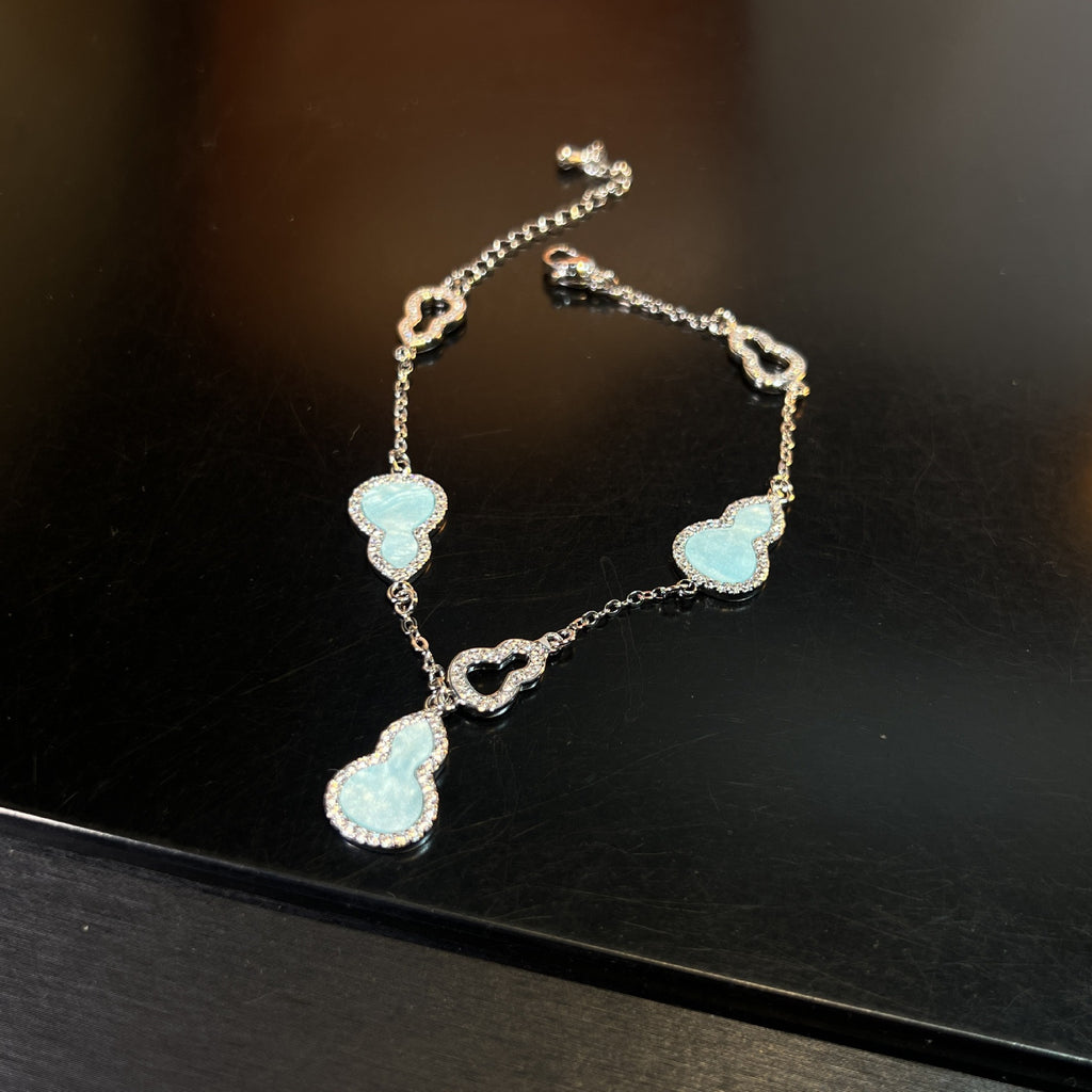 Heart’s Desire Bracelet – Adjustable Pink/Blue Zirconia Love Charm | Everyday Elegance