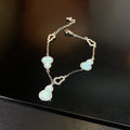 Heart’s Desire Bracelet – Adjustable Pink/Blue Zirconia Love Charm | Everyday Elegance