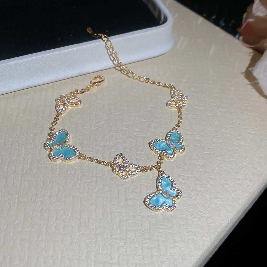Layered Butterfly Chain Bracelet – Vintage Gold Tone with Purple/Pink/White/Blue Zirconia