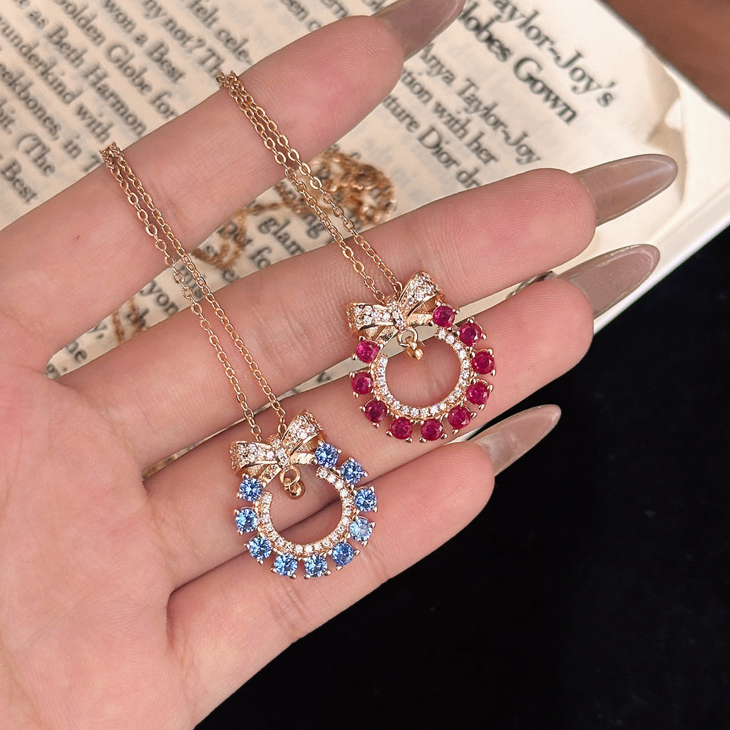 Candy Bow Necklace – Champagne Gold with Blue or Red Pendant