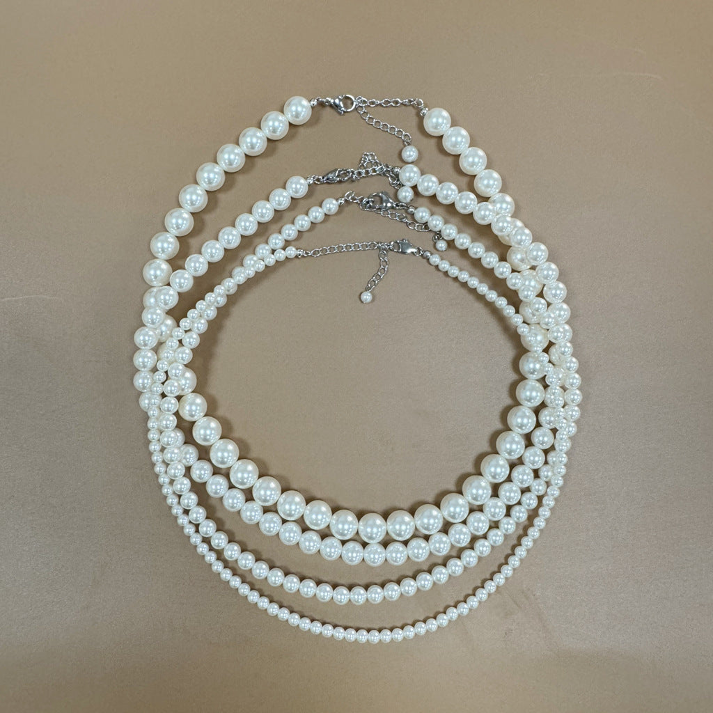 Timeless Solitaire · Upgraded Titanium Steel Clasp Pearl Necklace