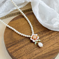 Elegant Camellia Pearl Set – 18K Gold Plated Necklace & S925 Earrings