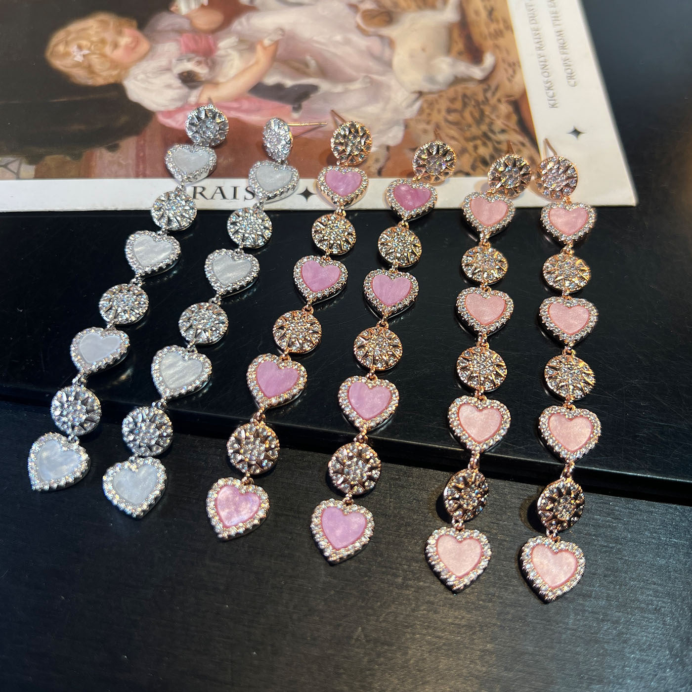 Mother‑of‑Pearl Linked Heart Earrings – Pink, Lavender & White