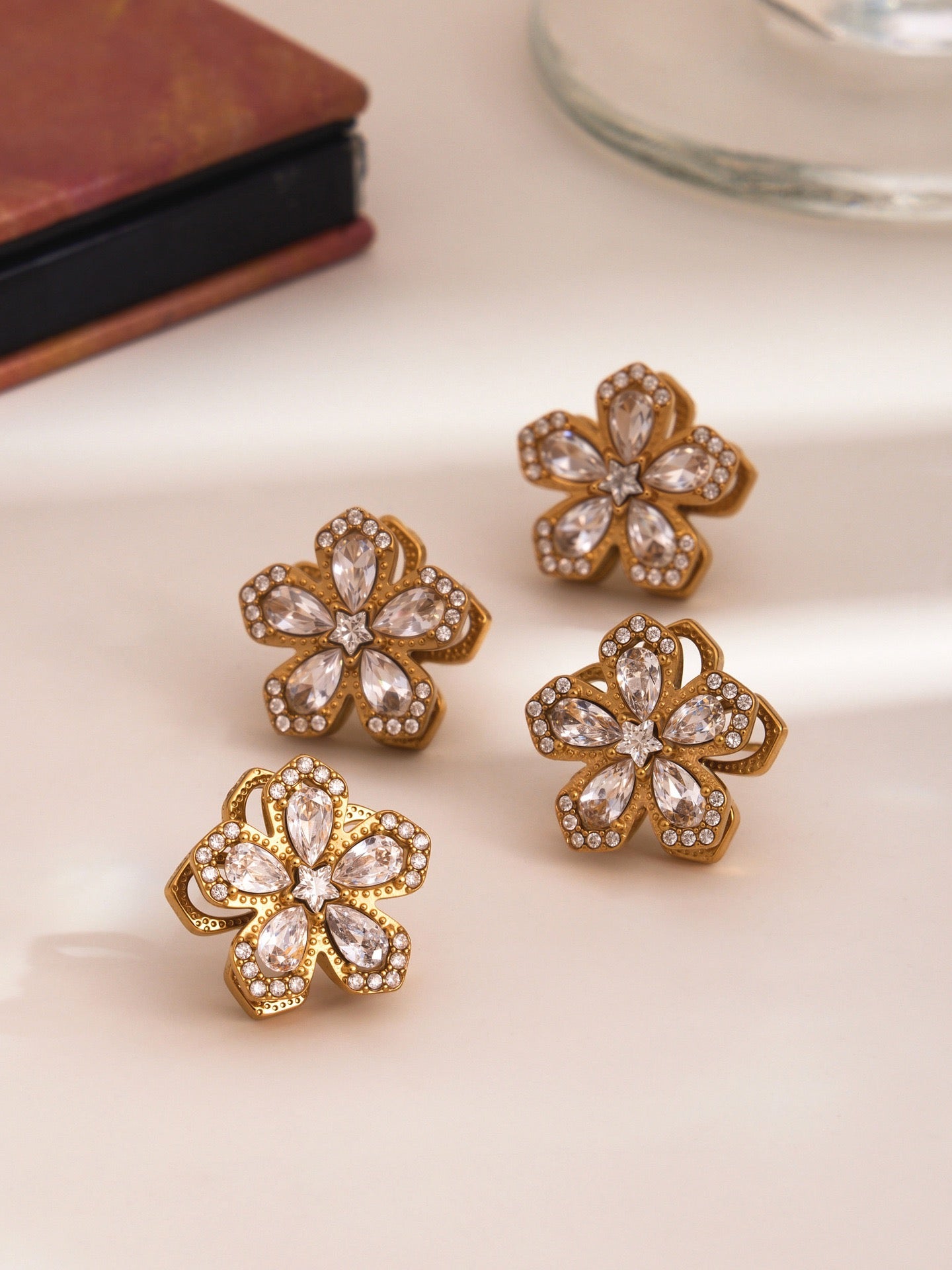 The Rotating Bloom Trio - Kinetic Five-Petal Flower Set in Stainless Steel & Zircon