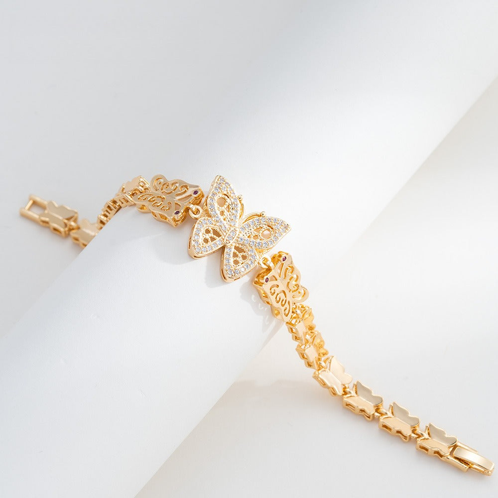 White Butterfly Pavé Bracelet – Gold Tone
